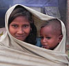 Girl & Boy Wrapped In Blanket